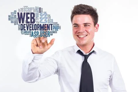 Web development - Young businessman touching word cloud Stock Photos