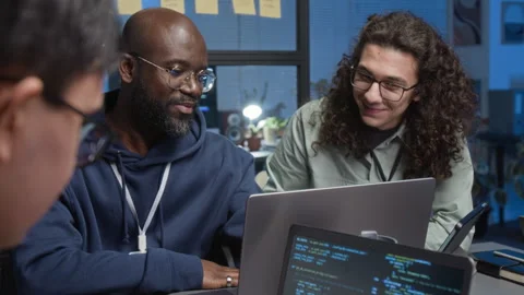 Web Engineer Developing Software, Two Positive Programmers Communicating Video stock 329615933