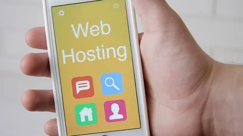 Web Hosting concept application on the smartphone. Man uses mobile app. Stock Footage 77414342