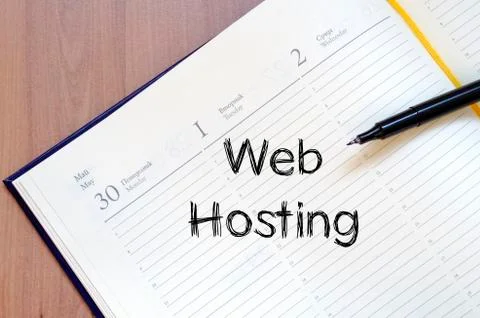 Web hosting write on notebook 写真素材