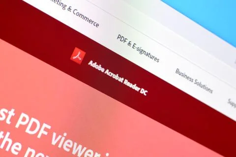 Web page of adobe acrobat reader product on official website on the display o Stock Photos