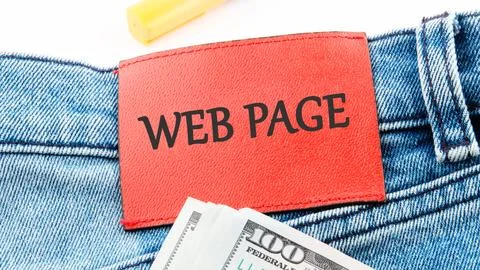 A web page label is prominently displayed on the waistband of denim pants. Ne Stock Photos