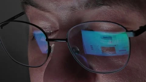Web Page Scrolling Reflection On Glasses Screen Close Up Shot Stock Footage 343021328
