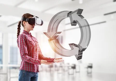 Web refresh icon in female hands as symbol for internet use. Mix Stock Photos