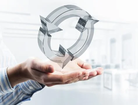 Web refresh icon in male hands as symbol for internet use. Mixed Stock Photos