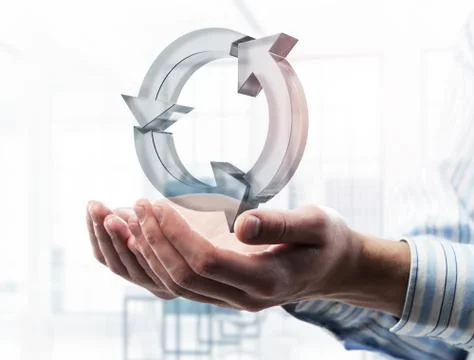 Web refresh icon in male hands as symbol for internet use. Mixed Stock Photos