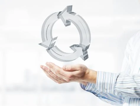 Web refresh icon in male hands as symbol for internet use. Mixed Stock Photos