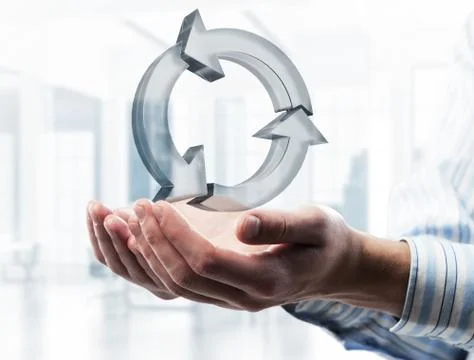 Web refresh icon in male hands as symbol for internet use. Mixed Stock Photos