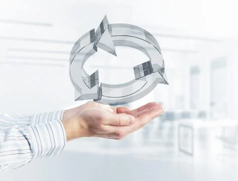 Web refresh icon in male hands as symbol for internet use. Mixed media Foto stock