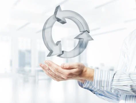 Web refresh icon in male hands as symbol for internet use. Mixed media Stock Photos