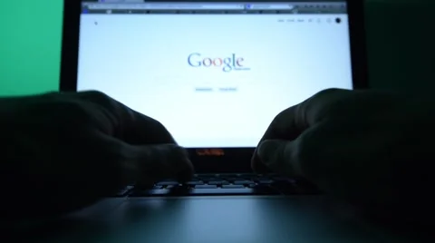 Web searching on a notebook at night Stock Footage 48665032