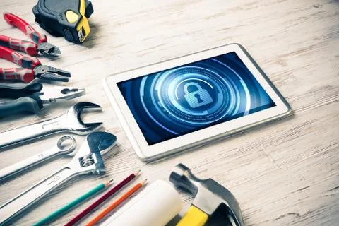 Web security and technology concept with tablet pc on wooden tab Stock Photos