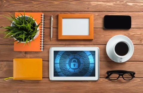 Web security and technology concept with tablet pc on wooden table Stock Photos