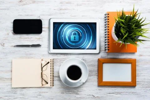 Web security and technology concept with tablet pc on wooden table Stock Photos