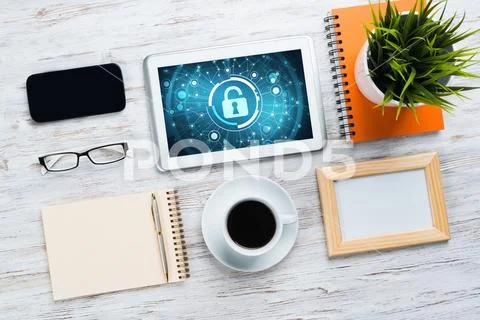 Web security and technology concept with tablet pc on wooden table Stock Photos