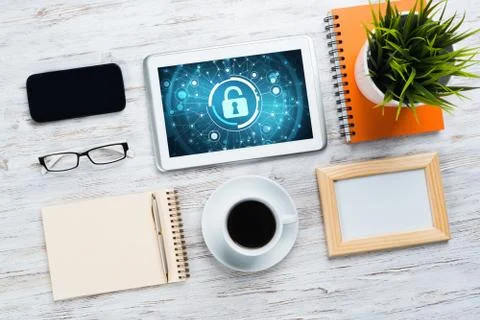 Web security and technology concept with tablet pc on wooden table Stock Photos