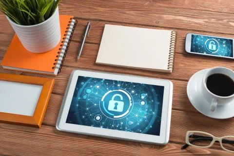 Web security and technology concept with tablet pc on wooden table Stock Photos