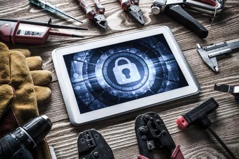 Web security and technology concept with tablet pc on wooden tab Stock Photos