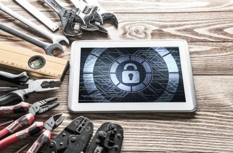 Web security and technology concept with tablet pc on wooden tab Stock Photos