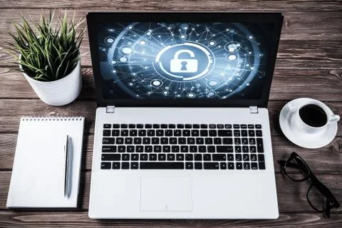 Web security and technology concept with laptop on wooden table Stock Photos
