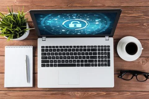 Web security and technology concept with laptop on wooden table Stock Photos