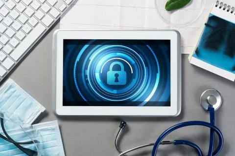 Web security and technology concept with tablet pc on table Stock Photos