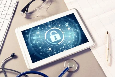 Web security and technology concept with tablet pc on table Stock Photos