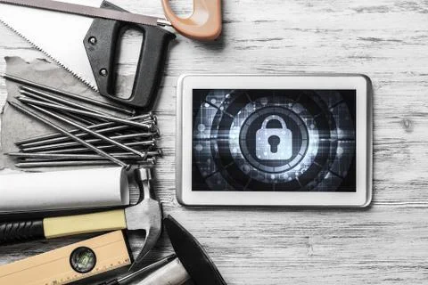 Web security and technology concept with tablet pc on wooden tab Stock Photos