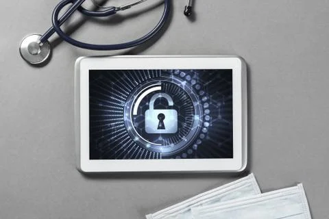 Web security and technology concept with tablet pc on table Stock Photos