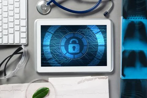 Web security and technology concept with tablet pc on table Stock Photos