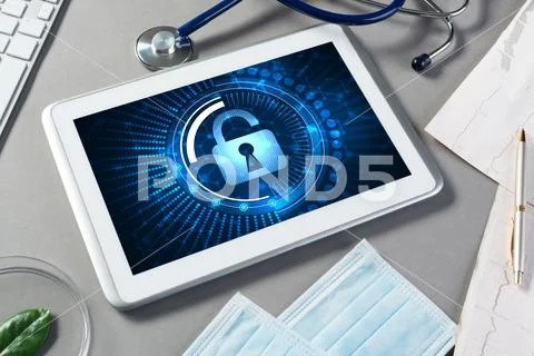 Web security and technology concept with tablet pc on table Stock Photos
