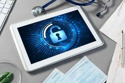 Web security and technology concept with tablet pc on table Stock Photos