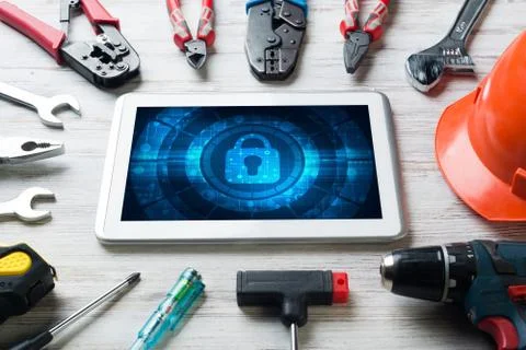 Web security and technology concept with tablet pc on wooden table Stock Photos