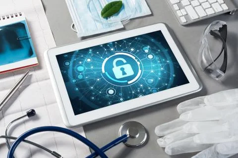 Web security and technology concept with tablet pc on table Stock Photos
