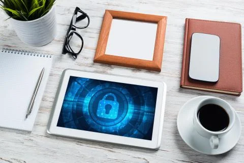 Web security and technology concept with tablet pc on wooden table Stock Photos