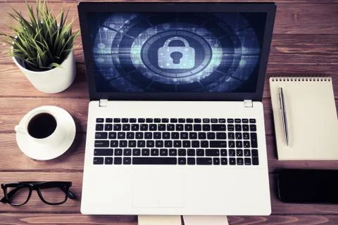 Web security and technology concept with laptop on wooden table Stock Photos