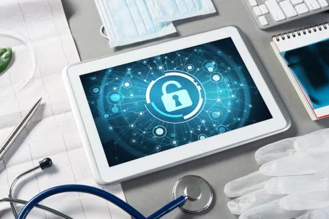 Web security and technology concept with tablet pc on table Stock Photos