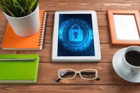 Web security and technology concept with tablet pc on wooden table Stock Photos
