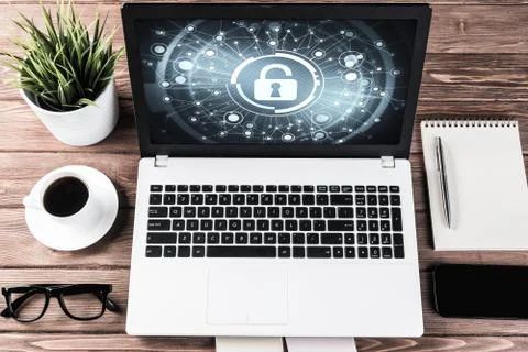 Web security and technology concept with laptop on wooden table Stock Photos