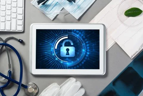 Web security and technology concept with tablet pc on table Stock Photos