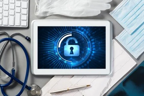 Web security and technology concept with tablet pc on table Stock Photos