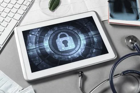 Web security and technology concept with tablet pc on table Stock Photos