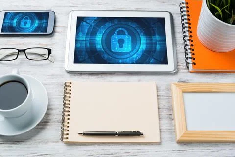Web security and technology concept with tablet pc on wooden table Stock Photos
