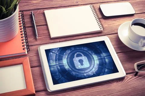 Web security and technology concept with tablet pc on wooden table Stock Photos