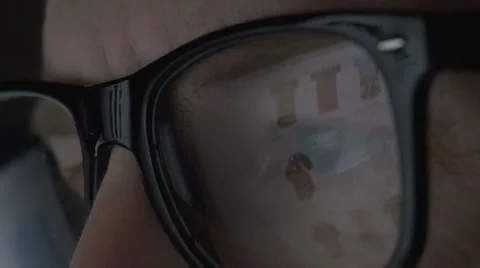 Web shopping reflected in glasses Stock Footage 61550262