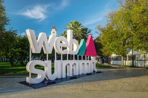 Web Summit display in a sunny park setting with palm trees, Lisbon, Portugal Stock Photos