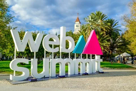 Web summit event signage under a cloudy sky near park, Lisbon, Portugal Foto stock