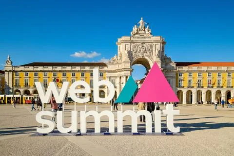 Web Summit sign at Praca do Comercio, Lisbon, Portugal on a sunny day with Rua Stock Photos
