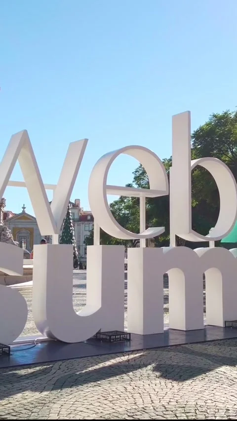Web Summit sign, square Rossio on sunny day. Lisbon, Portugal - Nov 10, 2021 Stock Footage 276307459