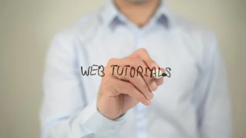 Web Tutorials , man writing on transparent screen Stock Photos